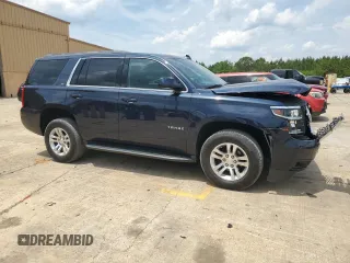2020 Chevrolet Tahoe LT with VIN 1GNSKBKC7LR162186, listed as a Copart auction lot 56729325 with 114,210 mi miles and Salvage title. Bid and sale history available at DreamBid. Image 4.