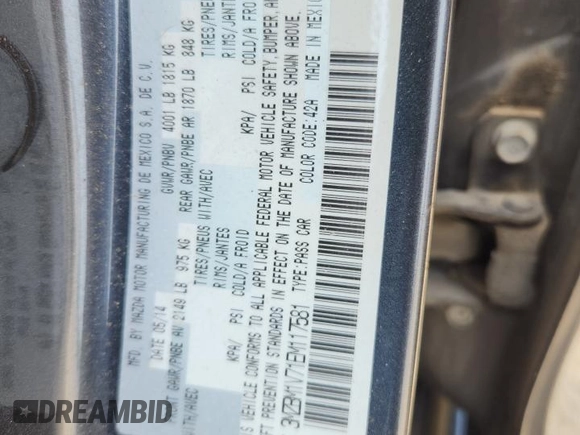 2014 Mazda 3 i Touring with VIN 3MZBM1V71EM117581, listed as a Copart auction lot 61588925 with 115,486 mi miles and Salvage title. Bid and sale history available at DreamBid. Image 12.