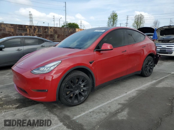 2021 Tesla Model Y Long Range with VIN 5YJYGDEEXMF217816, listed as a Copart auction lot 51008665 with 57,392 mi miles and Salvage Title. Bid and sale history available at DreamBid. Image 1.