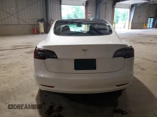 2023 Tesla Model 3 with VIN 5YJ3E1EA6PF588701, listed as a Copart auction lot 61446355 with Not provided miles and Salvage title. Bid and sale history available at DreamBid. Image 6.