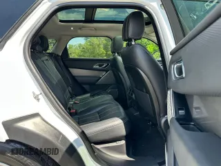 2018 Land Rover Range Rover Velar S z VIN SALYB2RV3JA746101, wystawiony jako Copart lot #64204745 z przebiegiem 69 220 mil mil oraz Czysty tytuł • Clean title. Historia ofert i sprzedaży dostępna na DreamBid. Obrazek 5.