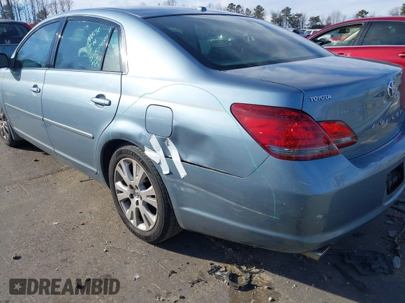 2009 Toyota Avalon XL with VIN 4T1BK36B19U350297, listed as a IAAI auction lot 41589714 with 141,003 mi miles. Bid and sale history available at carsss.com. Image 6.