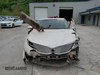 2014 Lincoln MKZ Hybrid с VIN 3LN6L2LU3ER833502, выставлен на аукционе Copart как лот 55996595 с пробегом Не указан миль и Списание • Salvage title. История ставок и продаж доступна на DreamBid. Изображение 5.