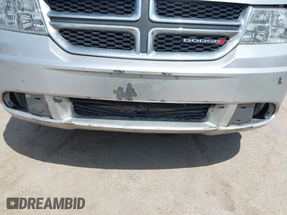 2014 Dodge Journey SE with VIN 3C4PDCAB0ET284437, listed as a IAAI auction lot 42063601 with 206,913 mi miles and . Bid and sale history available at carsss.com. Image 6.