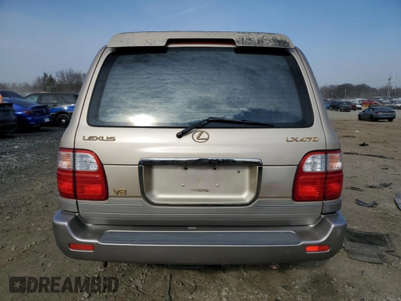 2002 Lexus LX 470 z VIN JTJHT00W323520240, wystawiony jako Copart lot #46495595 z przebiegiem 187 788 mil mil oraz Szkoda całkowita • Salvage title. Historia ofert i sprzedaży dostępna na DreamBid. Obrazek 6.