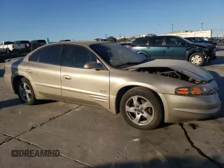 2002 Pontiac Bonneville SLE z VIN 1G2HY54K424205499, wystawiony jako Copart lot #76815334 z przebiegiem 84 715 mil mil oraz Szkoda całkowita • Salvage title. Historia ofert i sprzedaży dostępna na DreamBid. Obrazek 4.