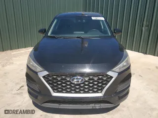 2019 Hyundai Tucson SE with VIN KM8J23A44KU971088, listed as a Copart auction lot 49725005 with 114,587 mi miles and Clean Title. Bid and sale history available at carsss.com. Image 5.