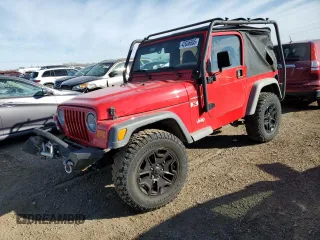 2002 Jeep Wrangler X with VIN 1J4FA39S32P771120, listed as a Copart auction lot 42636665 with 153,168 mi miles and Salvage Title. Bid and sale history available at carsss.com. Image 1.