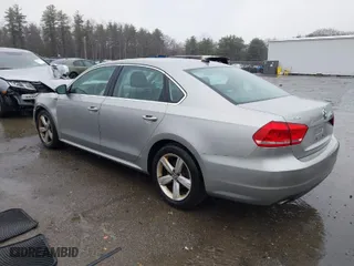 2012 Volkswagen Passat SE w/Sunroof with VIN 1VWBP7A35CC081714, listed as a IAAI auction lot 41864409 with 152,603 mi miles. Bid and sale history available at carsss.com. Image 3.