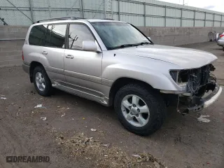 2001 Toyota Land Cruiser with VIN JTEHT05J912005517, listed as a Copart auction lot 50911195 with 273,929 mi miles and Salvage Title. Bid and sale history available at carsss.com. Image 4.