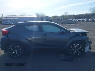 2022 Toyota C-HR XLE z VIN NMTKHMBXXNR145682, wystawiony jako IAAI lot #42104874 z przebiegiem 88 141 mil mil oraz . Historia ofert i sprzedaży dostępna na DreamBid. Obrazek 13.