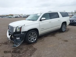 2015 GMC Yukon XL Denali with VIN 1GKS2JKJ7FR641430, listed as a IAAI auction lot 42163969 with 129,085 mi miles. Bid and sale history available at carsss.com. Image 2.