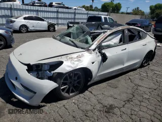 2023 Tesla Model 3 z VIN 5YJ3E1EA0PF491347, wystawiony jako Copart lot #64136235 z przebiegiem Nie podano mil oraz Czysty tytuł • Clean title. Historia ofert i sprzedaży dostępna na DreamBid. Obrazek 1.
