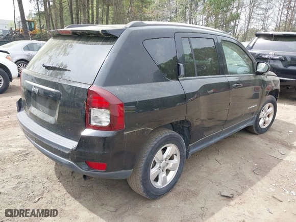 2014 Jeep Compass Sport with VIN 1C4NJCBA8ED844538, listed as a IAAI auction lot 41951190 with 157,000 mi miles. Bid and sale history available at carsss.com. Image 4.