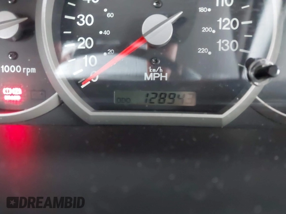 2004 Kia Sedona LX with VIN KNDUP131546535352, listed as a IAAI auction lot 41856784 with 128,943 mi miles. Bid and sale history available at carsss.com. Image 12.