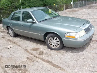 2005 Mercury Grand Marquis LS Premium z VIN 2MHHM75W95X607697, wystawiony jako IAAI lot #42453303 z przebiegiem 142 879 mil mil oraz . Historia ofert i sprzedaży dostępna na DreamBid. Obrazek 1.