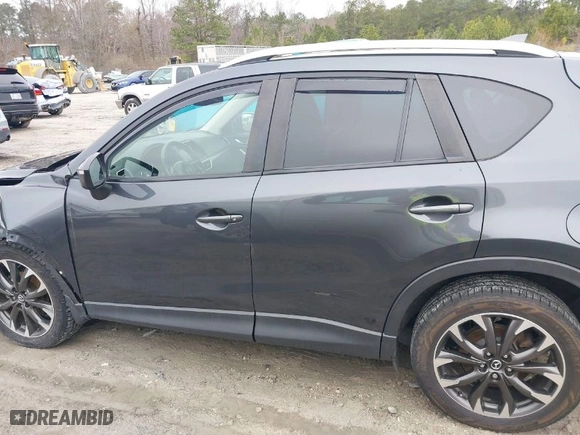 2016 Mazda CX-5 Grand Touring with VIN JM3KE4DY8G0796290, listed as a IAAI auction lot 41619977 with NaN miles. Bid and sale history available at carsss.com. Image 14.