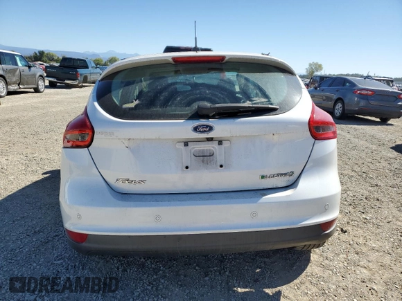 2016 Ford Focus Electric z VIN 1FADP3R46GL306266, wystawiony jako Copart lot #69018223 z przebiegiem 45 544 mil mil oraz . Historia ofert i sprzedaży dostępna na DreamBid. Obrazek 6.