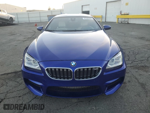 2014 BMW M6 z VIN WBS6C9C5XEDV73722, wystawiony jako Copart lot #87202664 z przebiegiem 68 283 mil mil oraz Szkoda całkowita • Salvage title. Historia ofert i sprzedaży dostępna na DreamBid. Obrazek 5.