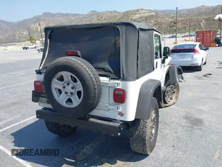 2003 Jeep Wrangler X with VIN 1J4FA39S73P321181, listed as a IAAI auction lot 42462732 with 170,460 mi miles and . Bid and sale history available at DreamBid. Image 4.
