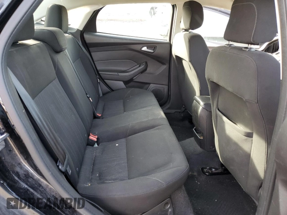 2018 Ford Focus SE z VIN 1FADP3FE6JL232769, wystawiony jako Copart lot #87667595 z przebiegiem 124 496 mil mil oraz Szkoda całkowita • Salvage title. Historia ofert i sprzedaży dostępna na DreamBid. Obrazek 10.