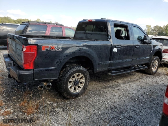 2022 Ford Super Duty F-350 SRW XL with VIN 1FT8W3BT6NEE48974, listed as a Copart auction lot 74527544 with 24,717 mi miles and Salvage Title. Bid and sale history available at carsss.com. Image 3.