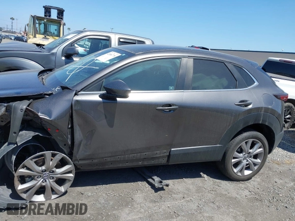 2021 Mazda CX-30 Select z VIN 3MVDMABL3MM233701, wystawiony jako IAAI lot #42086778 z przebiegiem Nie podano mil oraz . Historia ofert i sprzedaży dostępna na DreamBid. Obrazek 15.