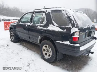 2000 Isuzu Rodeo S with VIN 4S2CK58W7Y4356886, listed as a IAAI auction lot 41586236 with 239,777 mi miles. Bid and sale history available at carsss.com. Image 3.