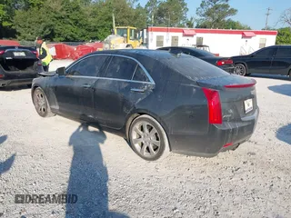2015 Cadillac ATS Sedan Luxury RWD with VIN 1G6AB5RX4F0122156, listed as a IAAI auction lot 42012891 with 137,879 mi miles. Bid and sale history available at carsss.com. Image 3.