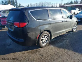 2022 Chrysler Voyager LX with VIN 2C4RC1CG8NR153008, listed as a IAAI auction lot 41648276 with NaN miles. Bid and sale history available at carsss.com. Image 4.