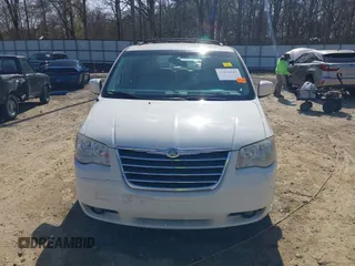 2009 Chrysler Town & Country Touring with VIN 2A8HR54X89R642118, listed as a IAAI auction lot 41844247 with 161,651 mi miles and . Bid and sale history available at DreamBid. Image 12.