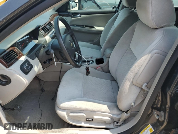 2014 Chevrolet Impala LT with VIN 2G1WB5E36E1135587, listed as a Copart auction lot 64557805 with 95,105 mi miles and Salvage title. Bid and sale history available at DreamBid. Image 7.