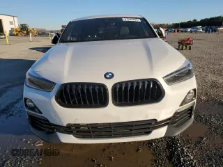 2018 BMW X2 sDrive28i with VIN WBXYJ3C3XJEJ81736, listed as a Copart auction lot 87390404 with 165,522 mi miles and Salvage Title. Bid and sale history available at carsss.com. Image 5.