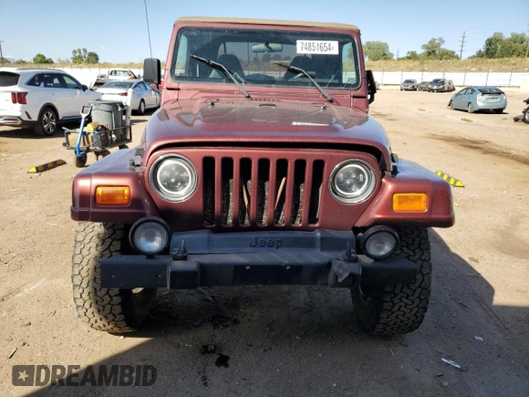 2002 Jeep Wrangler Sahara with VIN 1J4FA59S92P708647, listed as a Copart auction lot 74851654 with 131,794 mi miles and Salvage Title. Bid and sale history available at carsss.com. Image 5.