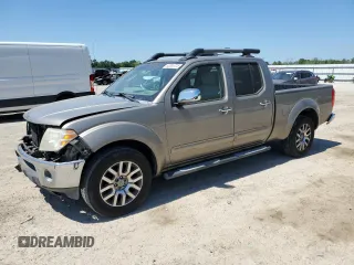 2009 Nissan Frontier LE with VIN 1N6AD09U29C413190, listed as a Copart auction lot 52885725 with 124,235 mi miles and Salvage title. Bid and sale history available at DreamBid. Image 1.