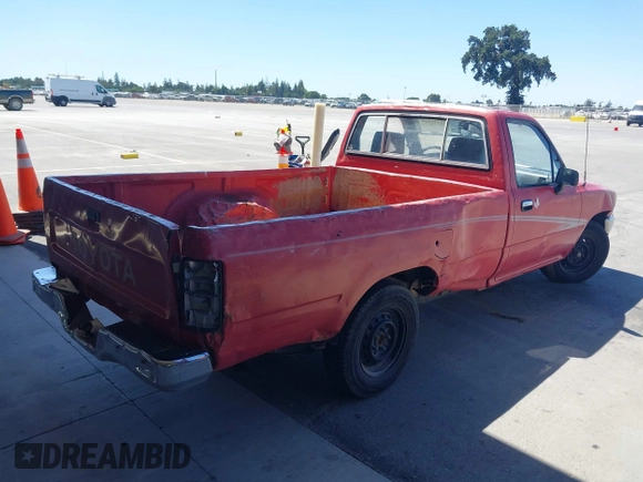 1992 Toyota Pickup DLX z VIN JT4RN82P8N5056666, wystawiony jako IAAI lot #42320829 z przebiegiem 147 032 mil mil oraz . Historia ofert i sprzedaży dostępna na DreamBid. Obrazek 4.