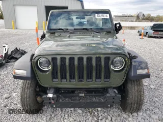 2023 Jeep Wrangler Sport S with VIN 1C4HJXDG0PW629815, listed as a Copart auction lot 53826875 with 9,260 mi miles and Salvage Title. Bid and sale history available at DreamBid. Image 5.