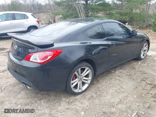 2010 Hyundai Genesis Coupe Track w/Nav with VIN KMHHU6KHXAU004544, listed as a IAAI auction lot 41882264 with 147,420 mi miles. Bid and sale history available at carsss.com. Image 4.