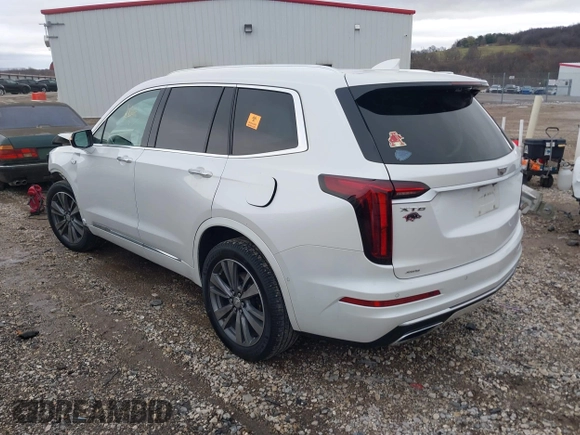 2021 Cadillac XT6 Premium Luxury with VIN 1GYKPFRS0MZ100879, listed as a IAAI auction lot 41083030 with 56,502 mi miles and . Bid and sale history available at DreamBid. Image 3.