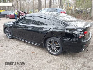 2019 Acura TLX w/A-Spec Pkg with VIN 19UUB1F6XKA004794, listed as a IAAI auction lot 41761436 with 91,087 mi miles. Bid and sale history available at carsss.com. Image 3.