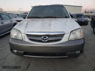 2003 Mazda Tribute LX with VIN 4F2YZ94133KM20084, listed as a Copart auction lot 82598104 with 216,848 mi miles and Salvage Title. Bid and sale history available at carsss.com. Image 5.