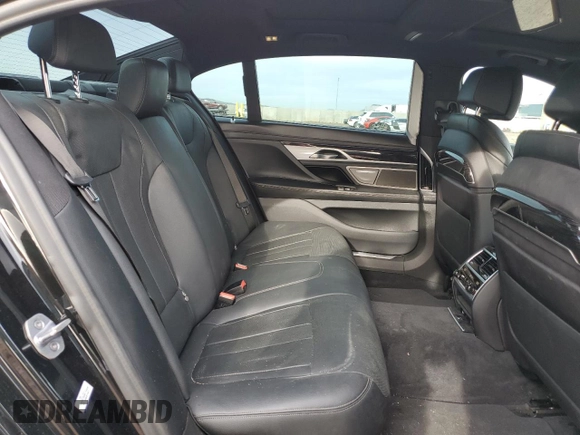 2019 BMW 7 Series 740i с VIN WBA7E2C55KB454929, выставлен на аукционе Copart как лот 49166235 с пробегом 57 051 миль миль и Списание • Salvage title. История ставок и продаж доступна на DreamBid. Изображение 10.