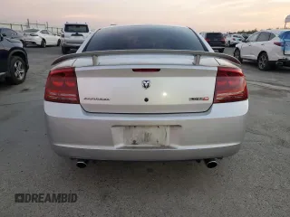 2006 Dodge Charger SRT-8 with VIN 2B3KA73W26H279925, listed as a Copart auction lot 78479574 with 127,443 mi miles and Salvage Title. Bid and sale history available at DreamBid. Image 6.