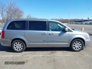 2013 Chrysler Town & Country Touring with VIN 2C4RC1BG9DR777819, listed as a IAAI auction lot 41824692 with 138,702 mi miles. Bid and sale history available at carsss.com. Image 13.