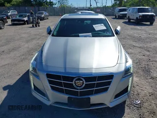2014 Cadillac CTS Luxury AWD with VIN 1G6AX5S34E0124464, listed as a IAAI auction lot 42298607 with 89,351 mi miles and . Bid and sale history available at DreamBid. Image 12.