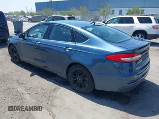 2019 Ford Fusion SE with VIN 3FA6P0HD6KR177660, listed as a IAAI auction lot 42164831 with 66,585 mi miles and . Bid and sale history available at DreamBid. Image 3.