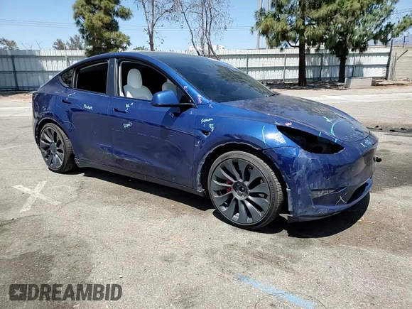 2021 Tesla Model Y Performance z VIN 5YJYGDEF0MF157795, wystawiony jako Copart lot #57163245 z przebiegiem 62 598 mil mil oraz Szkoda całkowita • Salvage title. Historia ofert i sprzedaży dostępna na DreamBid. Obrazek 14.