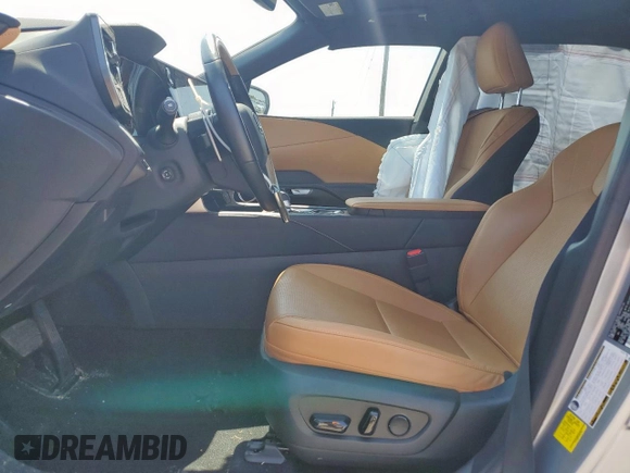 2023 Lexus RX 350 with VIN JTJCHMAA7P2002344, listed as a Copart auction lot 58018015 with 18,551 mi miles and Salvage title. Bid and sale history available at DreamBid. Image 7.