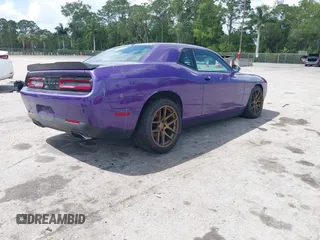 2016 Dodge Challenger R/T Plus Shaker z VIN 2C3CDZBTXGH191823, wystawiony jako IAAI lot #41881157 z przebiegiem 98 577 mil mil oraz . Historia ofert i sprzedaży dostępna na DreamBid. Obrazek 4.