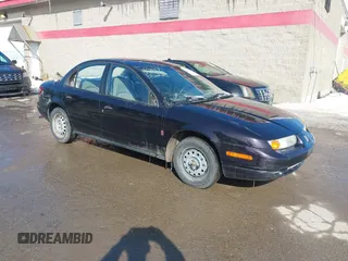2000 Saturn SL z VIN 1G8ZH5280YZ223608, wystawiony jako IAAI lot #41377752 z przebiegiem 180 857 mil mil oraz . Historia ofert i sprzedaży dostępna na DreamBid. Obrazek 1.